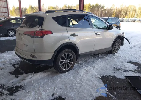 2018 Toyota Rav4 Limited z USA, uszkodzony, nr VIN JTMDFREV0JJ733931
